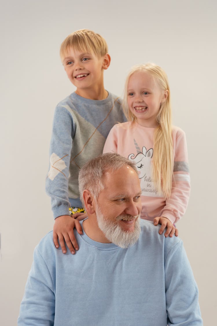 Elderly Man With His Grandchildren