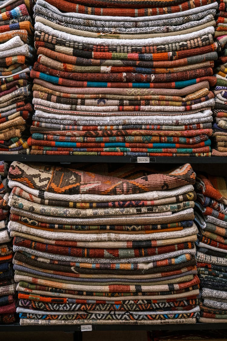 Shelves Stocked With Colorful Patterned Fabric