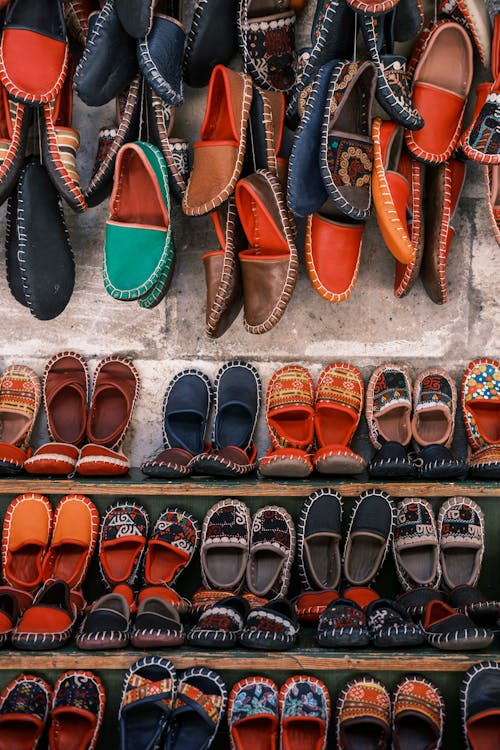 Free An Assortment of Shoes on Display Stock Photo
