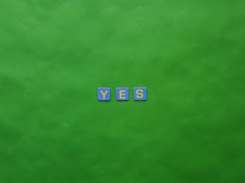 Yes in a Green Background