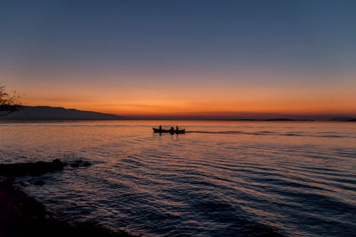 Fotos de stock gratuitas de agua, anochecer, barca