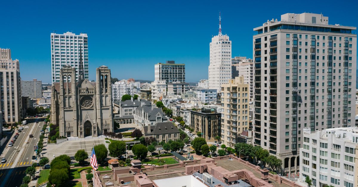 A stunning aerial view of Grace Cathedral amidst San Francisco's urban landscape.