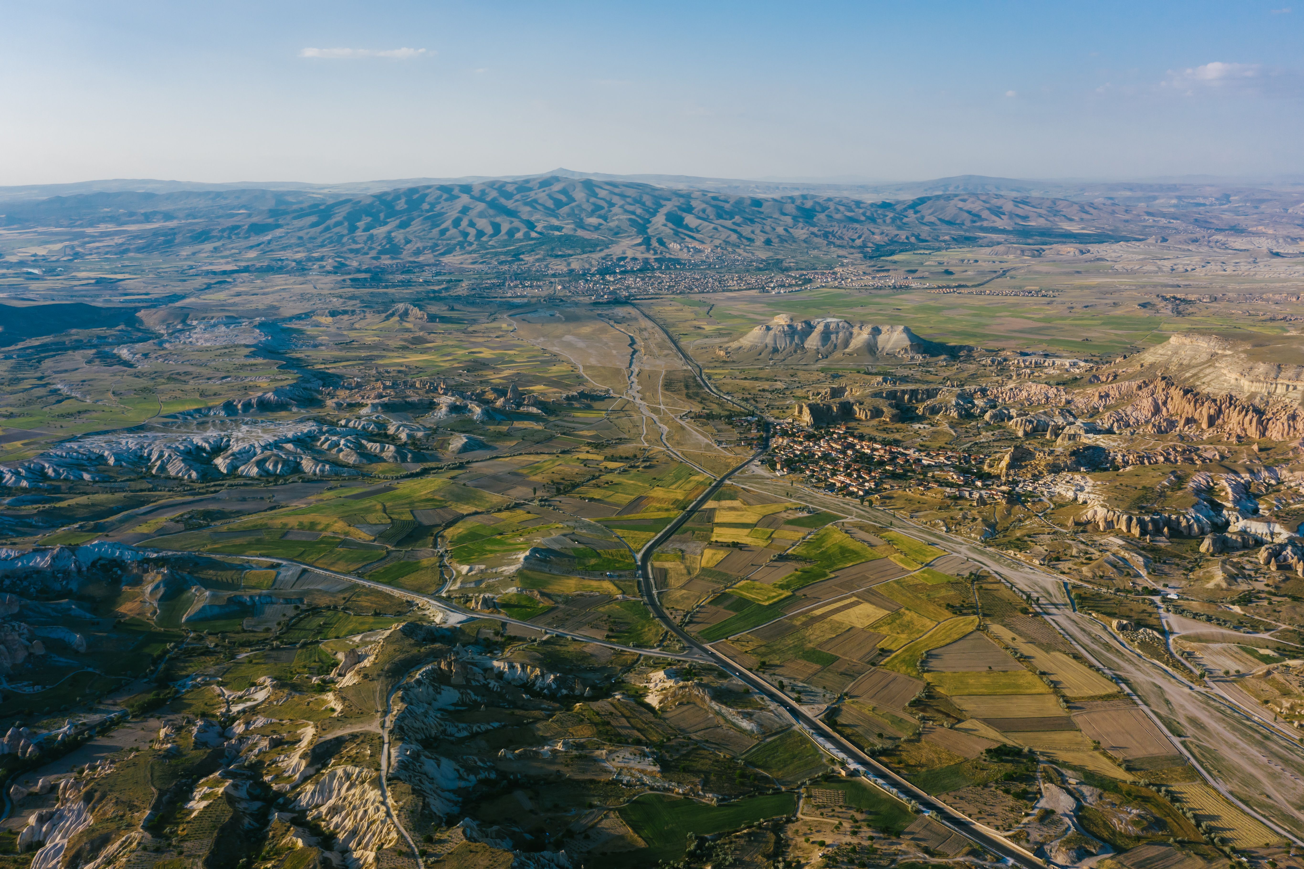 Best Gyrocopter over Pamukkale Travertines & Laodicea Review 2026 - Stunning aerial view of Cappadocia's unique terrain featuring rock formations and fields.
