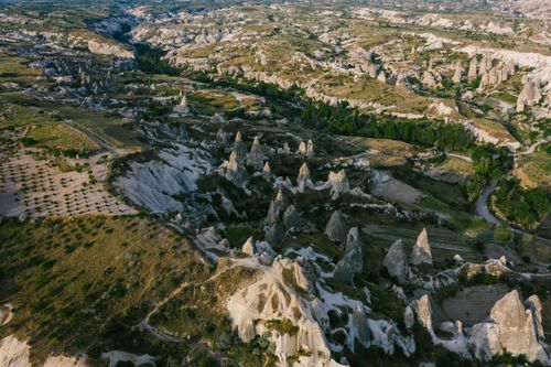 Free Stunning aerial shot of Cappadocia's distinctive geological formations, showcasing nature's artistry. Stock Photo