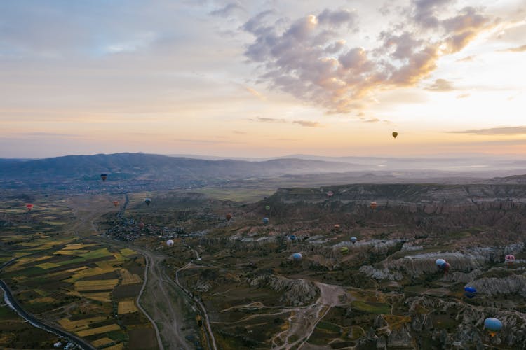 Hot Air Balloons Flying Over Cappadocia Rock Formations