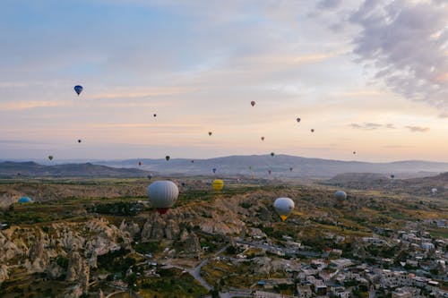 Δωρεάν στοκ φωτογραφιών με γραφικός, δύση του ηλίου, μπαλόνια με ζεστό αέρα