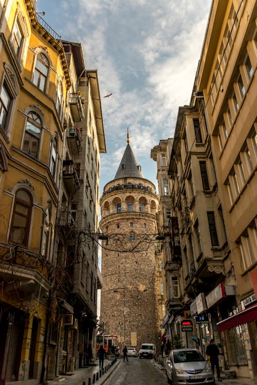 A Galata Tower Between Buildings on the Street