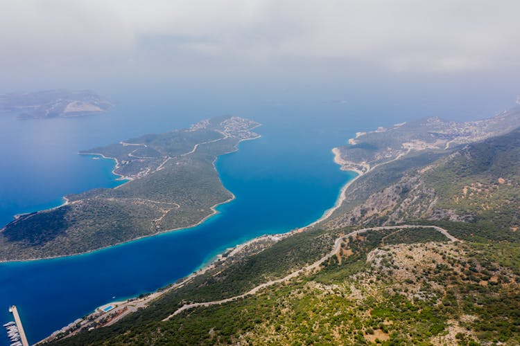 Aerial View Of Islands On Blue Body Of Water