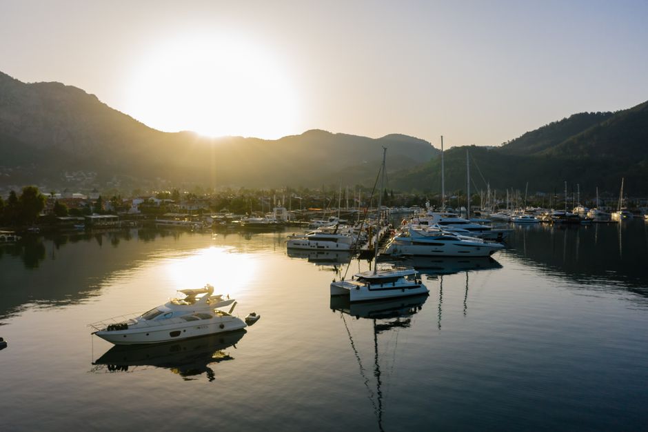 Outstanding 3in1: Night Jeep Safari & Boat Tour & Dinner from Alanya Review 2026 - Serene marina with yachts at sunset, perfect for luxury travel and relaxation.