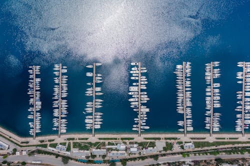Top View of a Marina and Sun Reflecting in the Sea