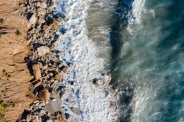 Sea Wave Breaking Against The Coast 