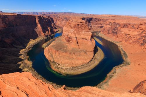 Free Breathtaking aerial shot of Horseshoe Bend, showcasing natural rock formations and the Colorado River in Arizona. Stock Photo