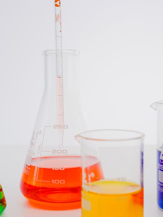 Close-Up View of Colorful Liquids in Laboratory Glasswares