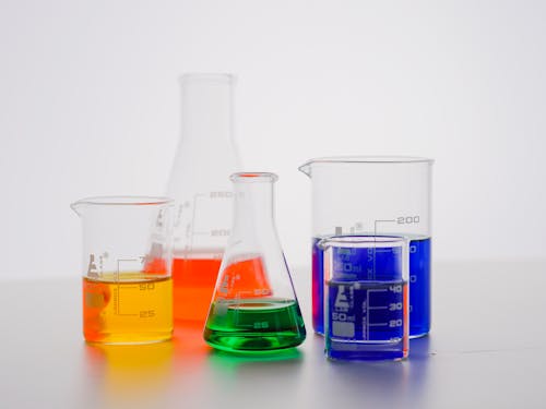 Close-Up View of Colorful Liquids in Laboratory Glasswares