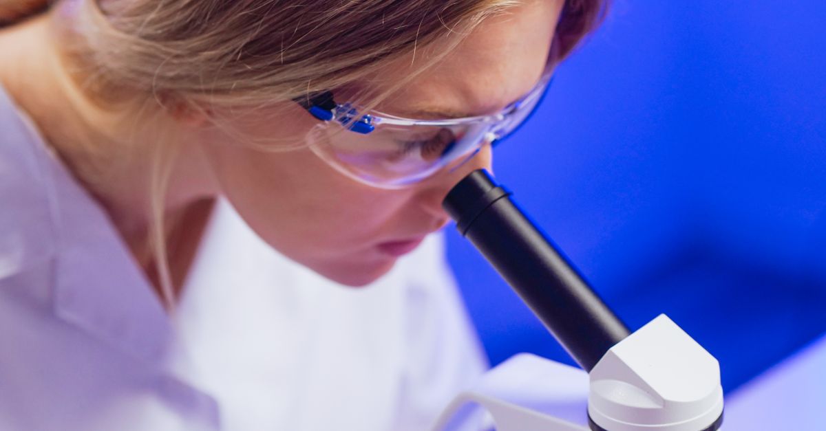 CRISPR gene editing laboratory research scientist microscope
