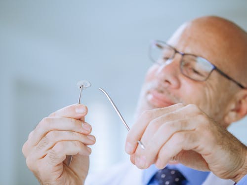 Close-Up View of a Man Doing an Experiment