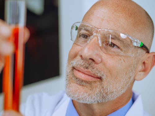 Free Close-Up View of a Man Doing an Experiment Stock Photo