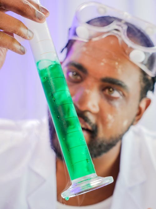 Close-Up View of a Man Doing an Experiment