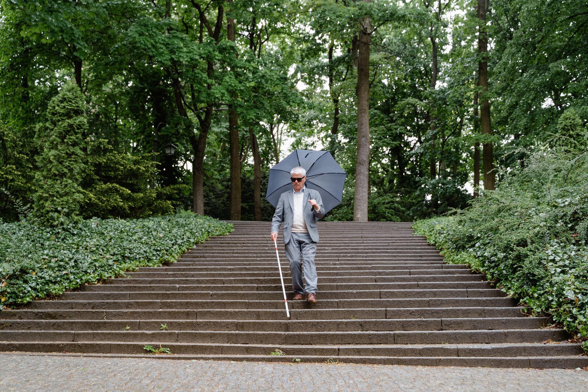 Photo of a Person Going Down the Steps