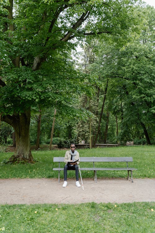 A Blind Man Sitting on the Bench