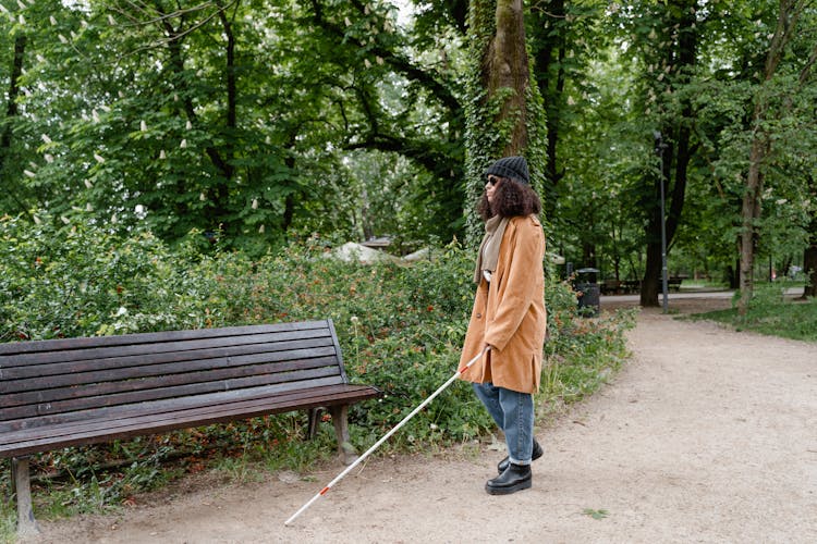 A Person Walking At A Park