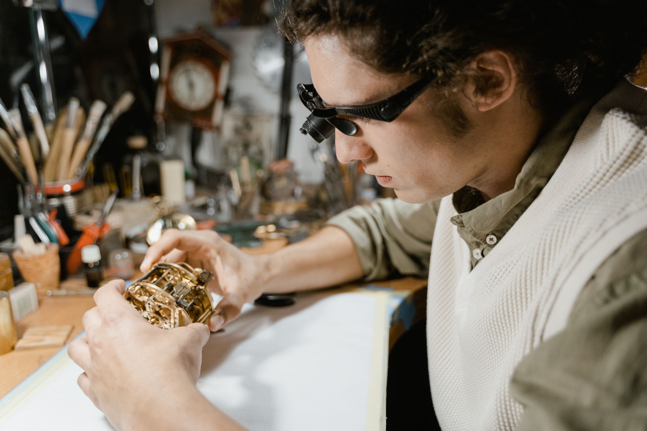 Man Fixing Clock Man Fixing Clock Mechanism · Free Stock Photo