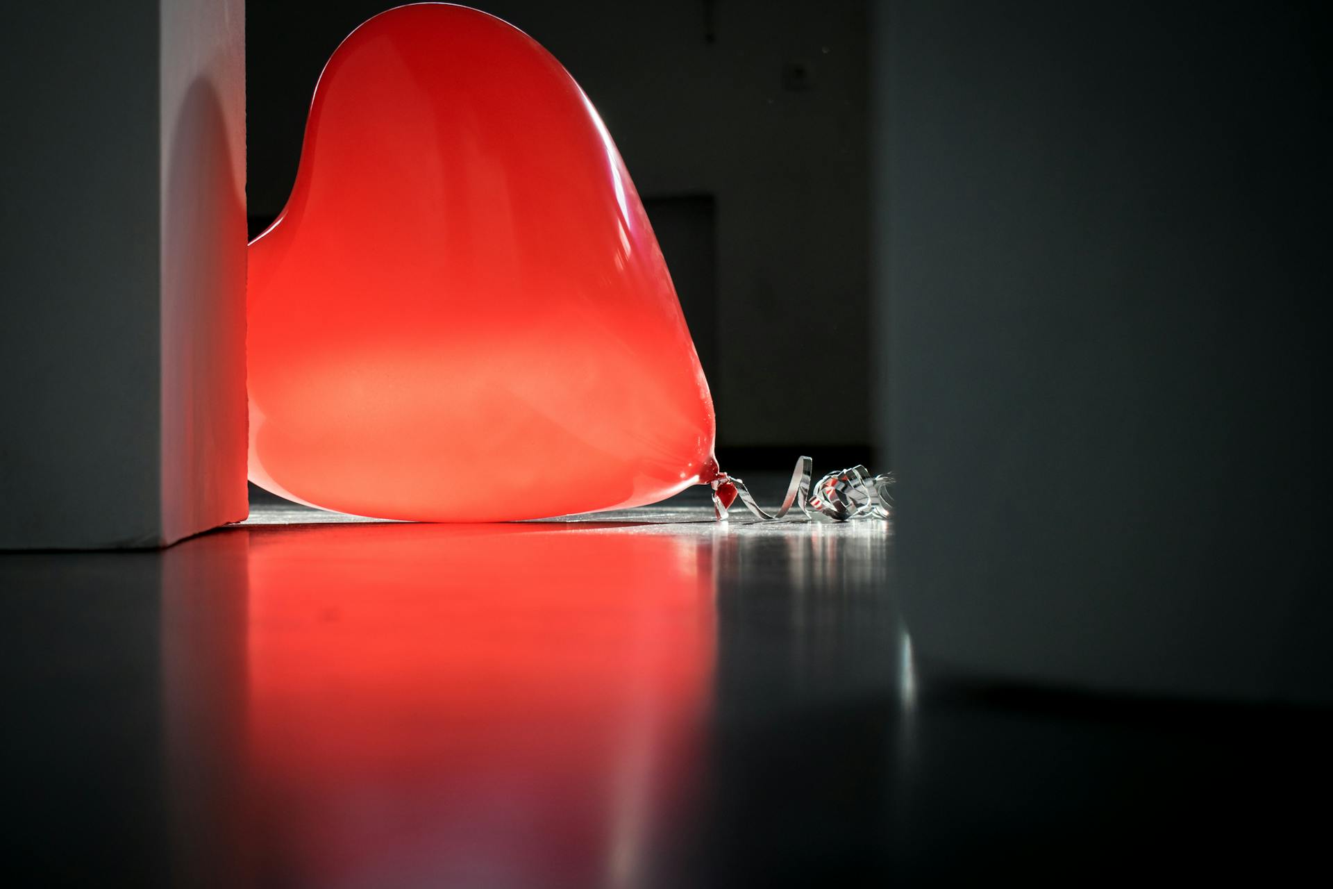 Red Heart Balloon on Top of Floor