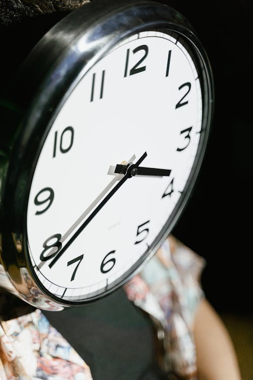 Free Close Up Photo of a Wall Clock Stock Photo