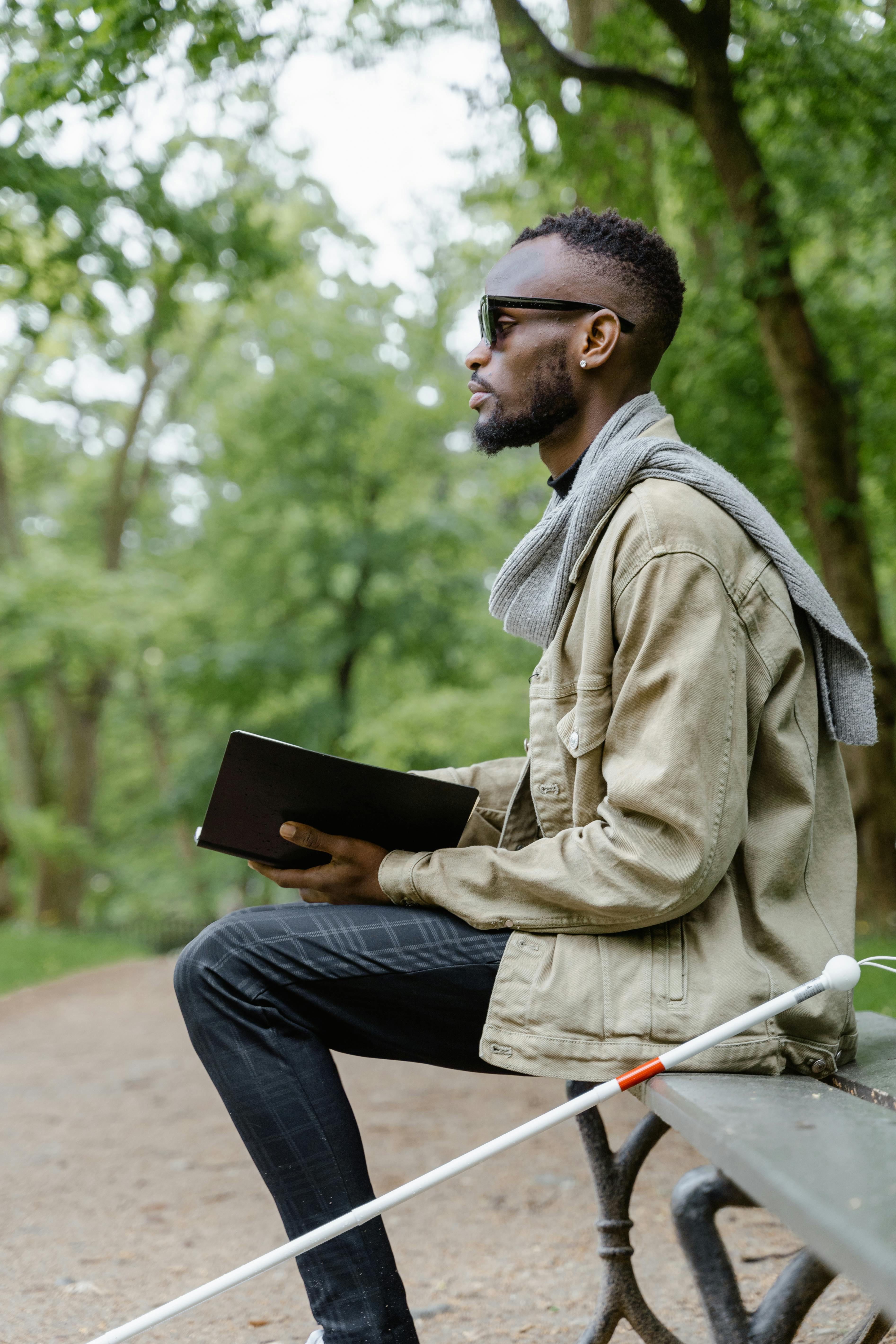 wood bench man sunglasses