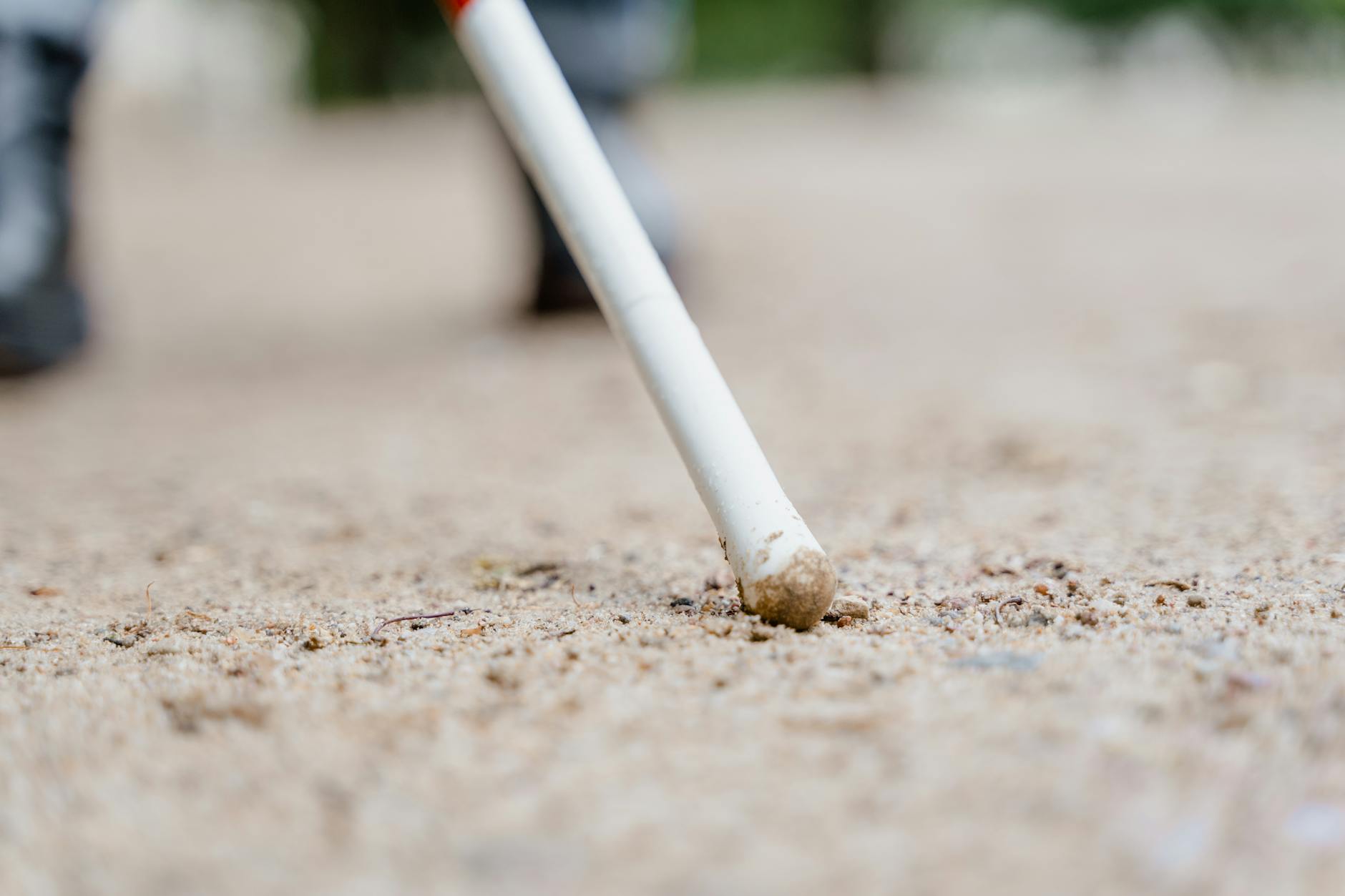 Clsoe-up of a White Cane on the Ground