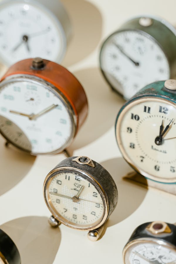 White and Brown Analog Alarm Clock