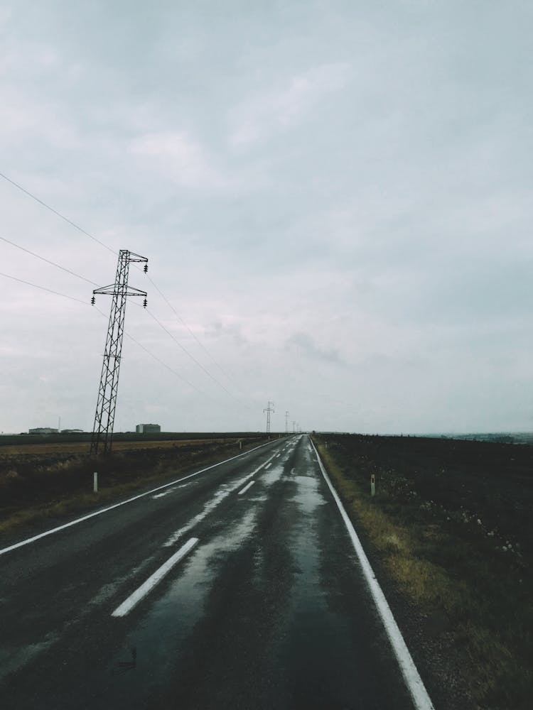 Pylons Along An Empty Asphalt Road 