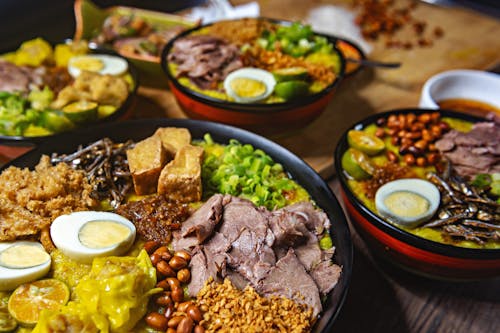 Cooked Dishes on Wooden Table