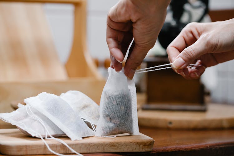 Hands Closing Reusable Tea Bags