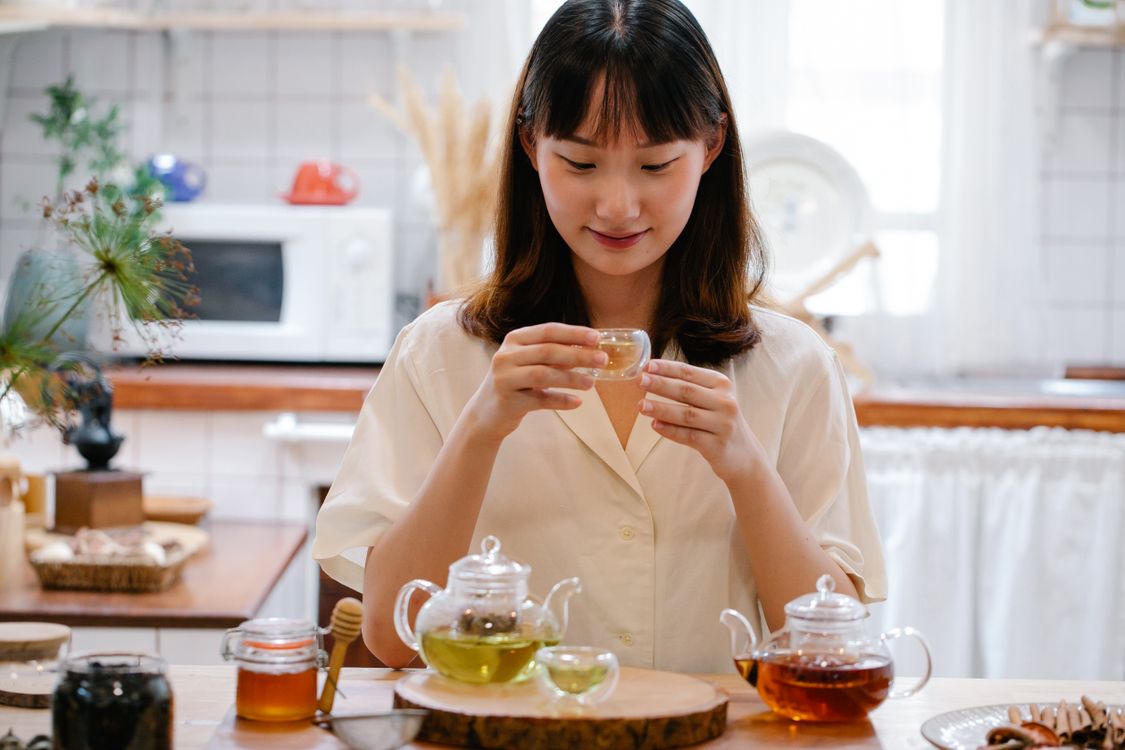 Woman Preparing Tea · Free Stock Photo