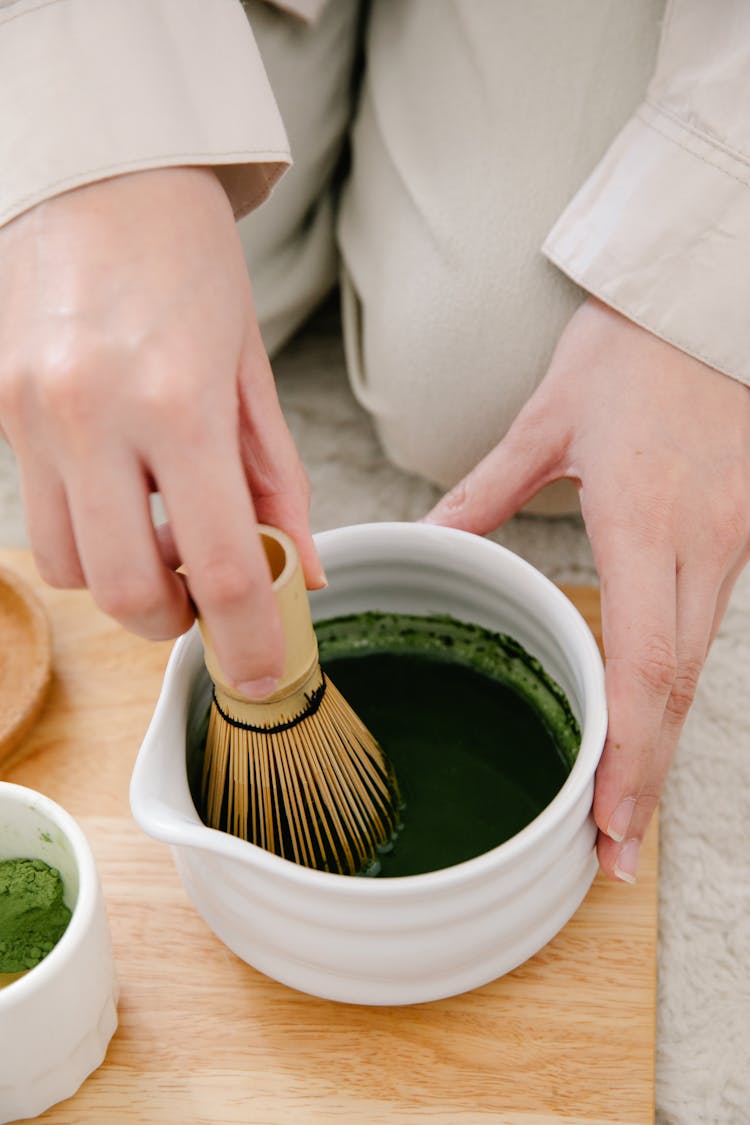 Hand Preparing Powdered Matcha Tea