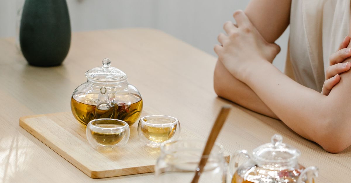Woman Having Tea Woman Having Tea at the Table · Free Stock Photo