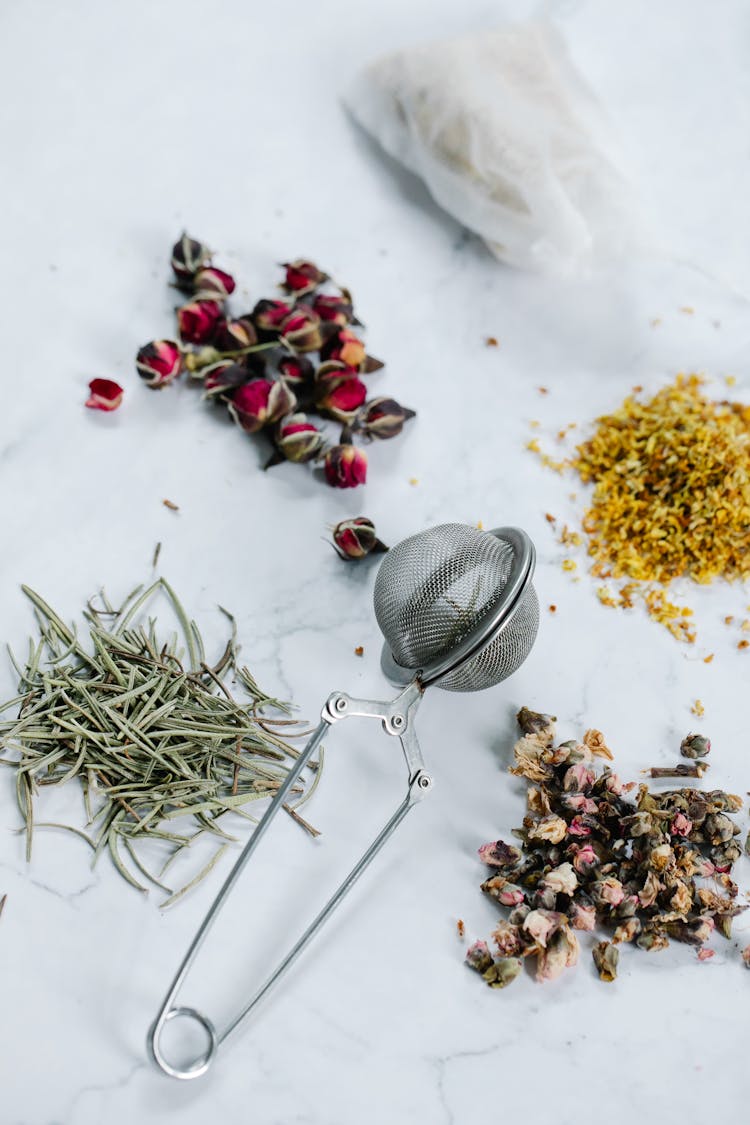 Tea Strainer And Herbs