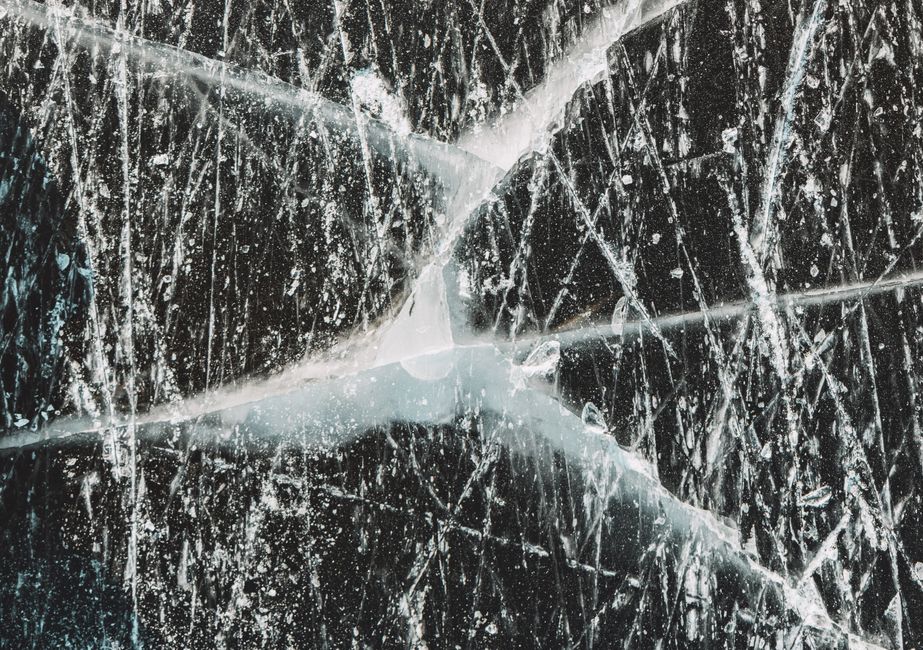ice forming in material cracks on a home's exterior ice forming in material cracks on a home's exterior