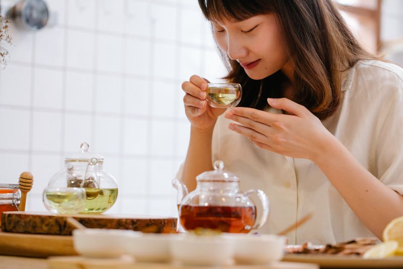 A woman preparing tea mindfully