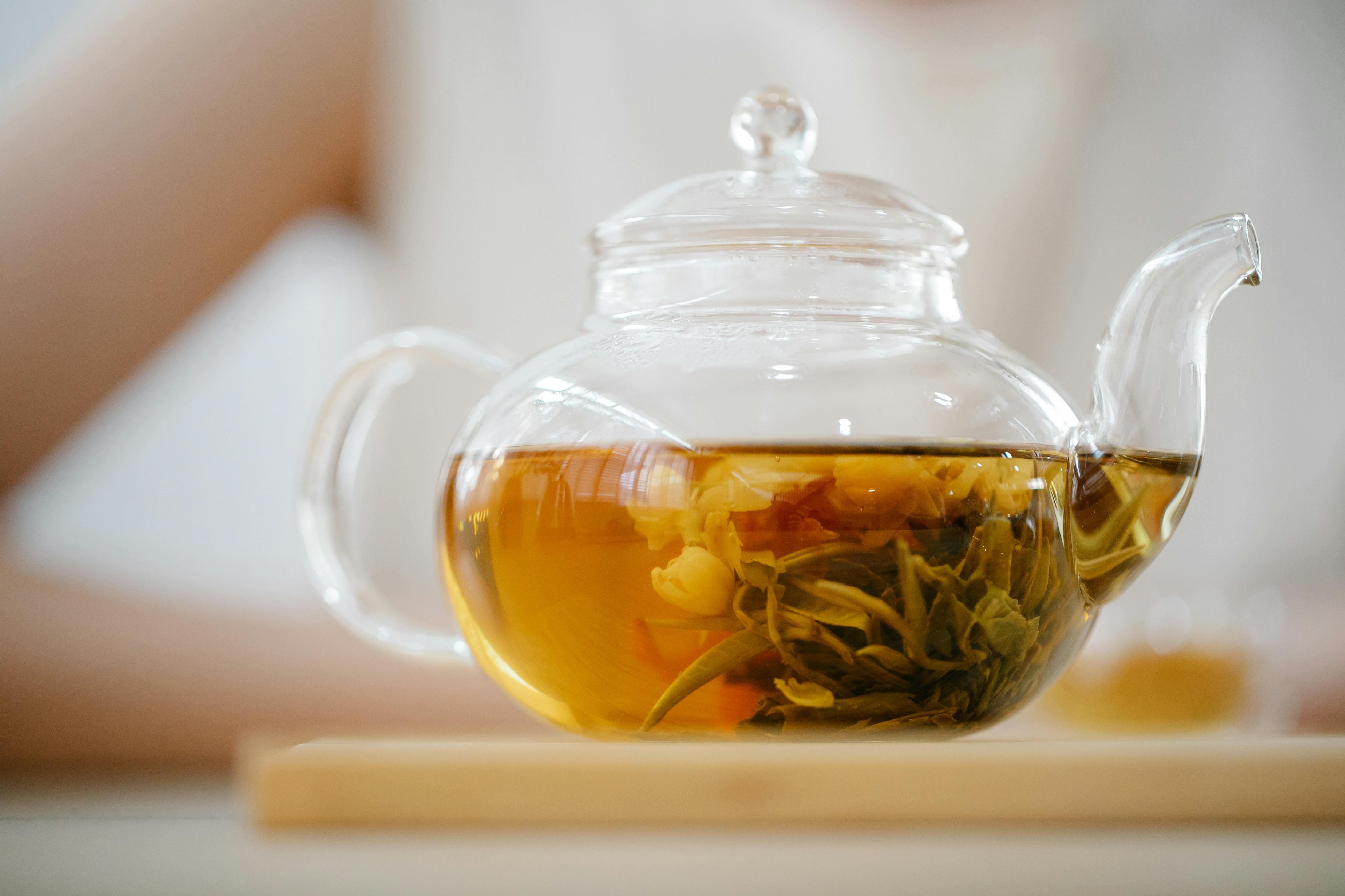 Free Close Up Photo of Clear Glass Teapot With Herbal Tea Stock Photo
