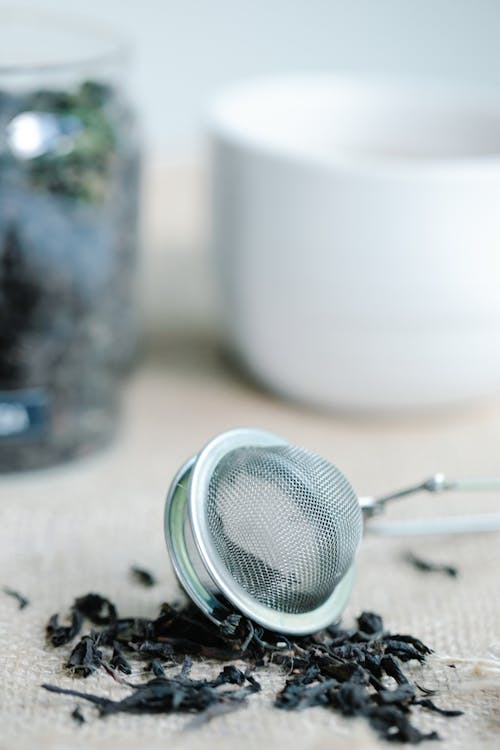 Steel Tea Net and Dry Tea Leaves 