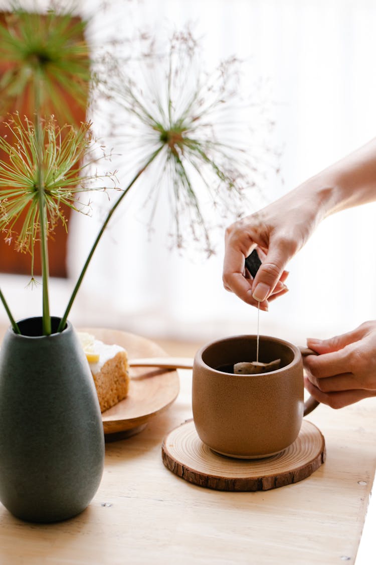 Female Hands Making Tea