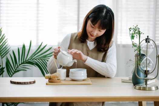 Woman Pouring Water