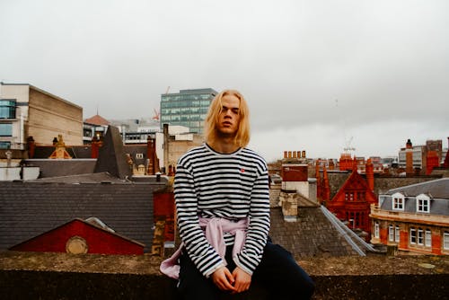 Man Wearing White And Black Striped Long-sleeved Top