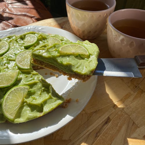 Close Up Photo of Sliced Cake on Ceramic Plate