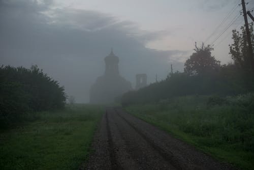 Free Ground Road to Church in Fog Stock Photo
