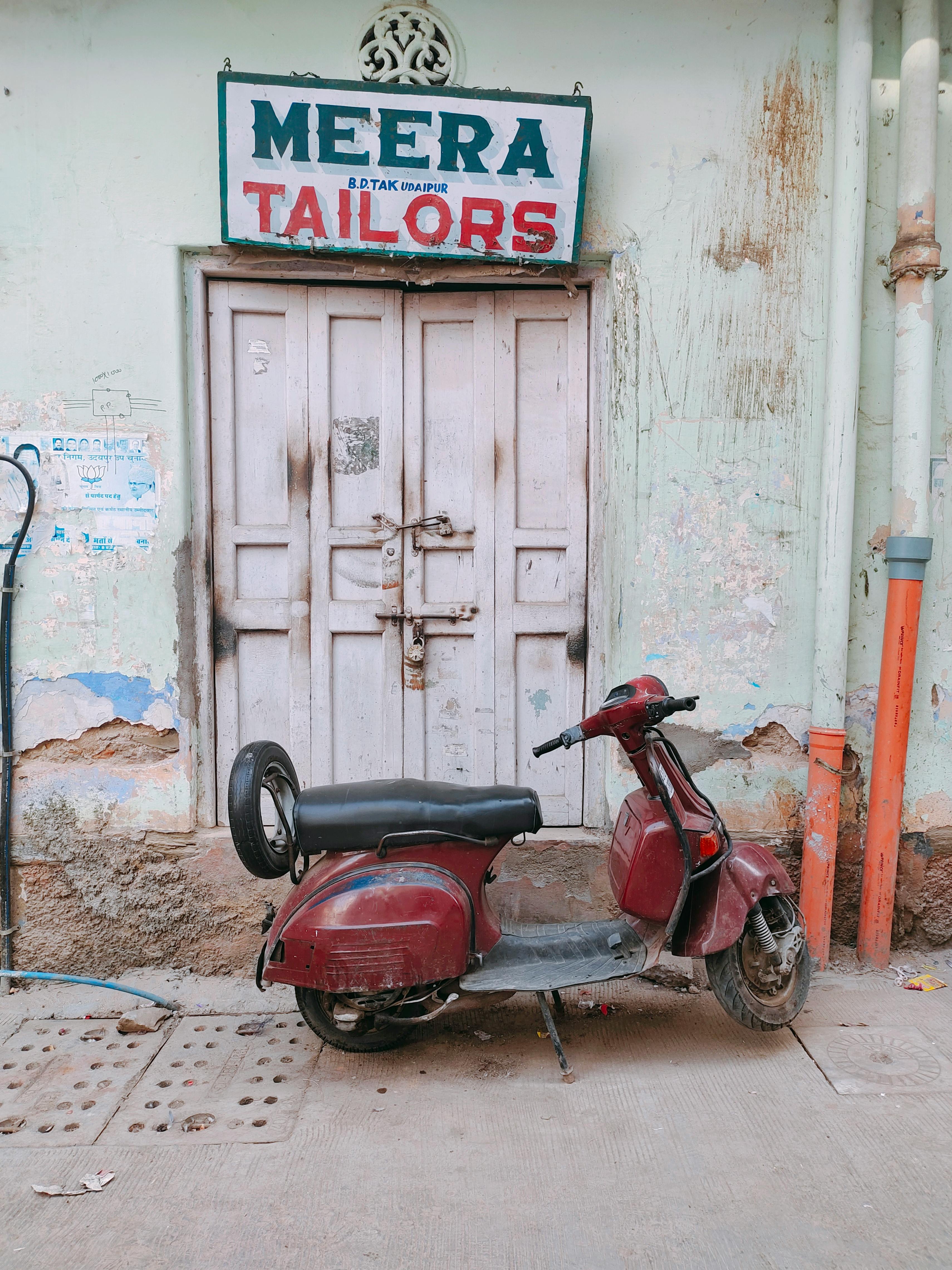 Old and Rusty Scooter in front of an Entrance to an Old Building · Free ...