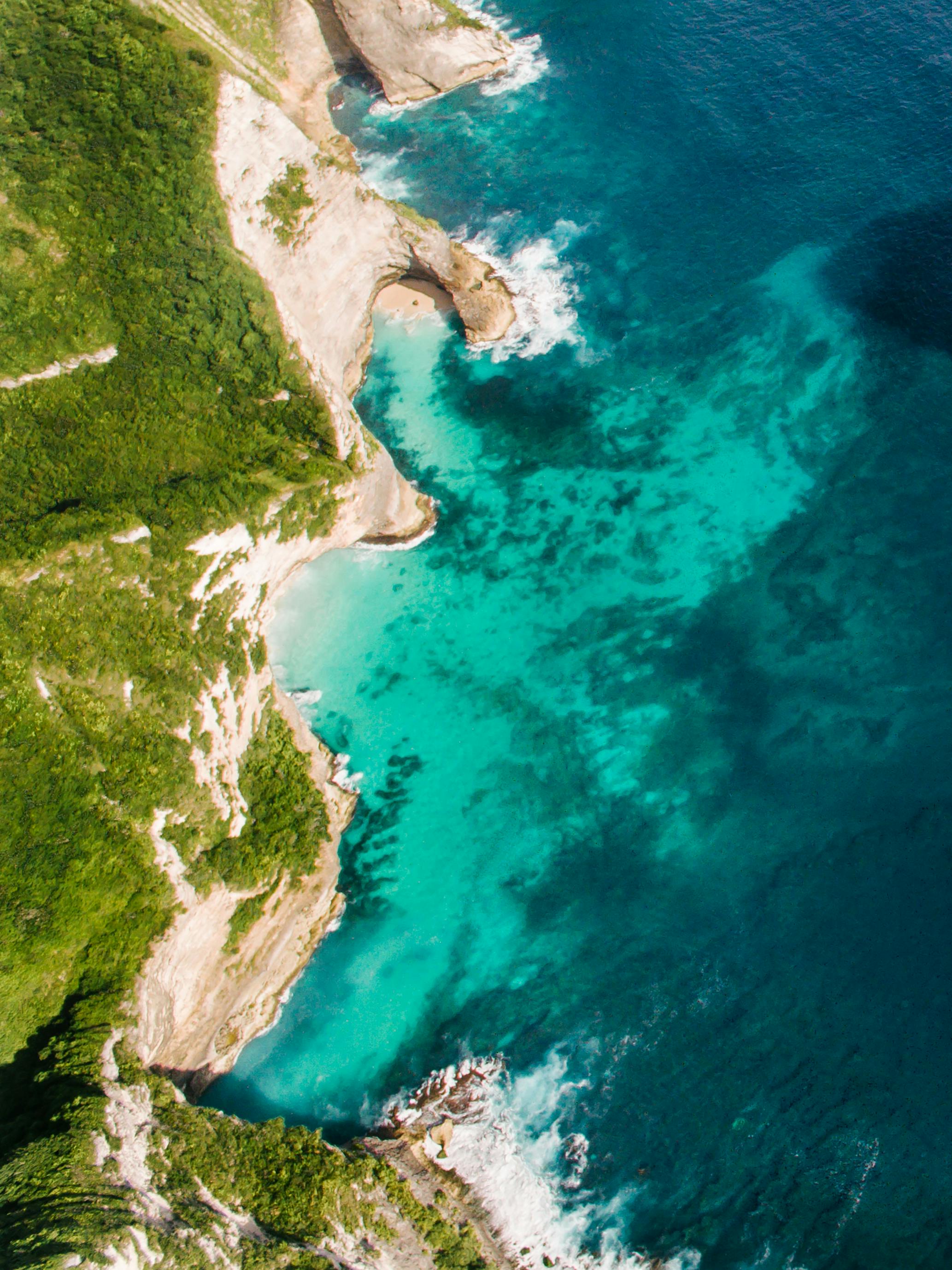 aerial view of a coast with turquoise water