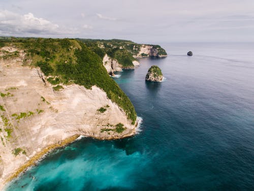 Drone Shot of a Coast and Deep Turquoise Water